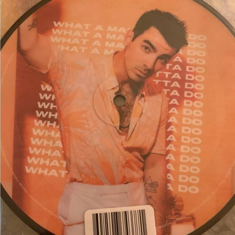 Orange and White Graphic Vinyl Record